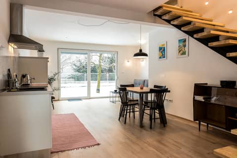 Bright new home with a garden and a parking