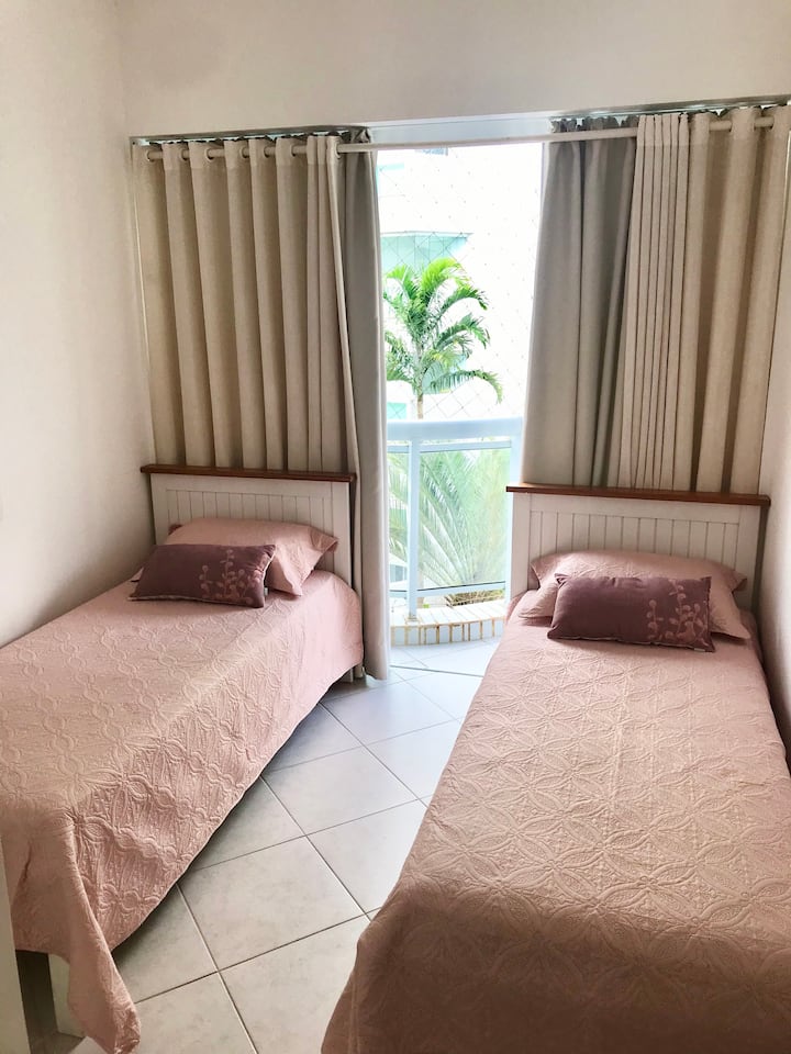 Bedroom with a single bed and a single bed. 