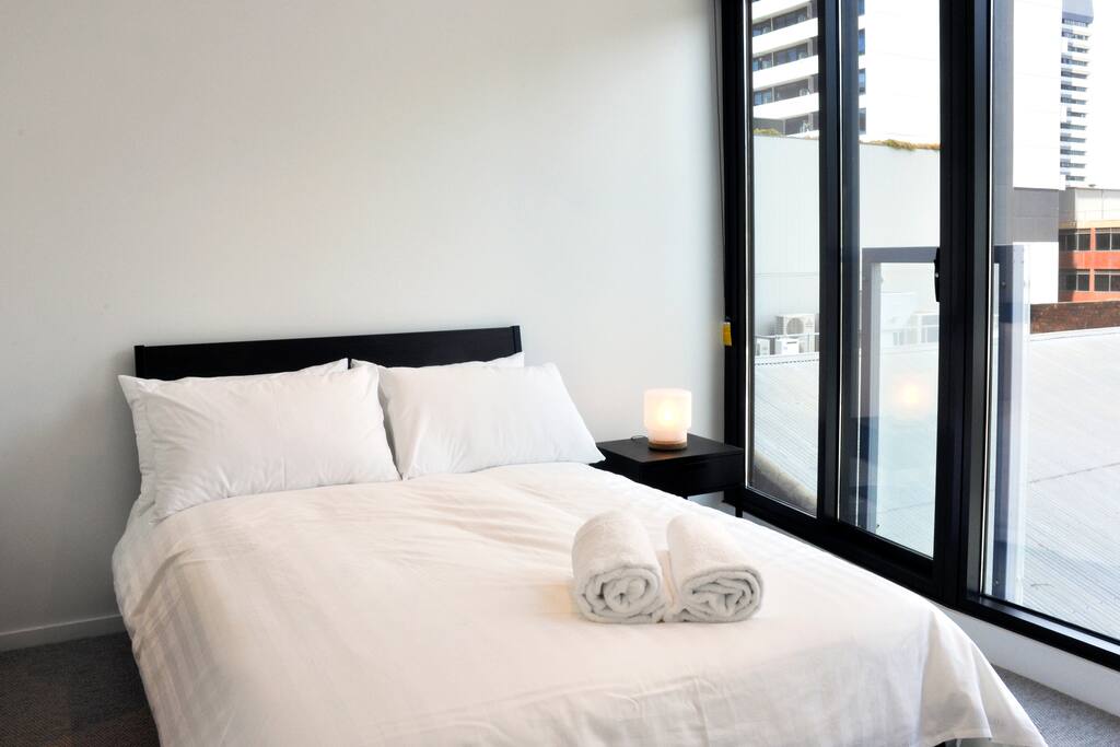 Comfortable bed with generous window opening.