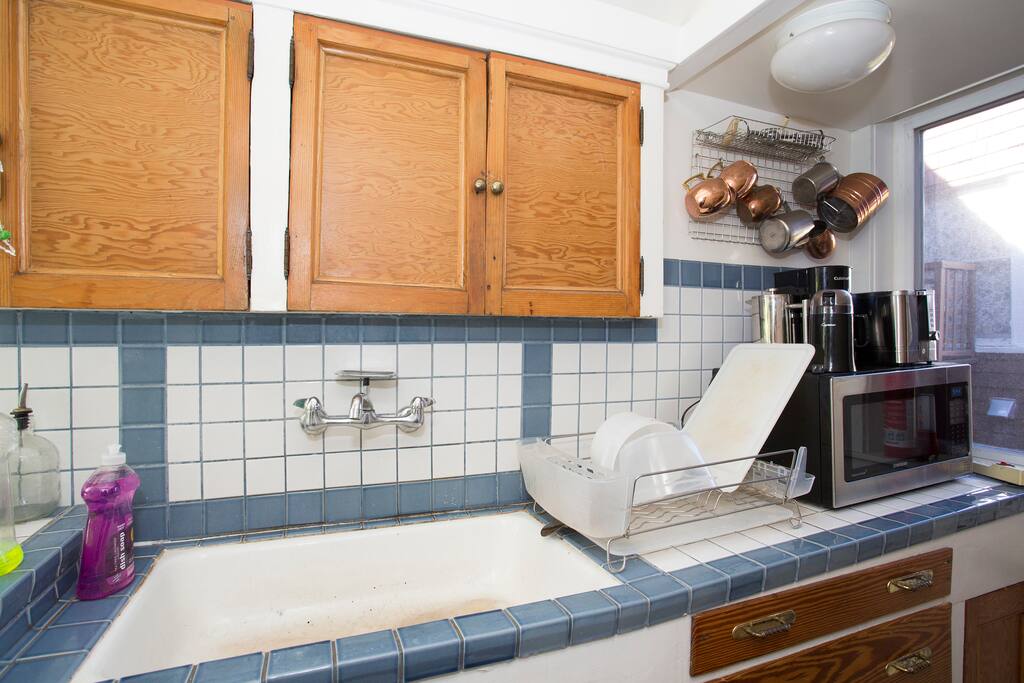 Coffee maker (coffee is on us!), microwave, and toaster