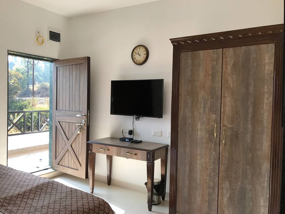 Large screen led Tv , full HD Tata sky package, free wifi, digital safe, iron etc.