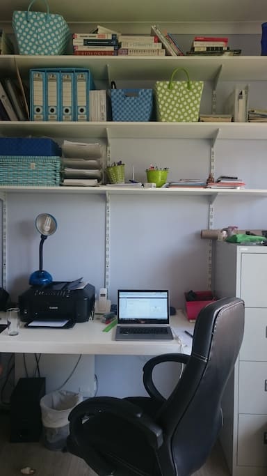 Home office with desk space and office chairs for 2 people, and internet access of course. Window looks out onto the garden.