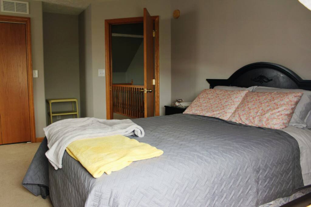 The bedroom with a queen size bed
