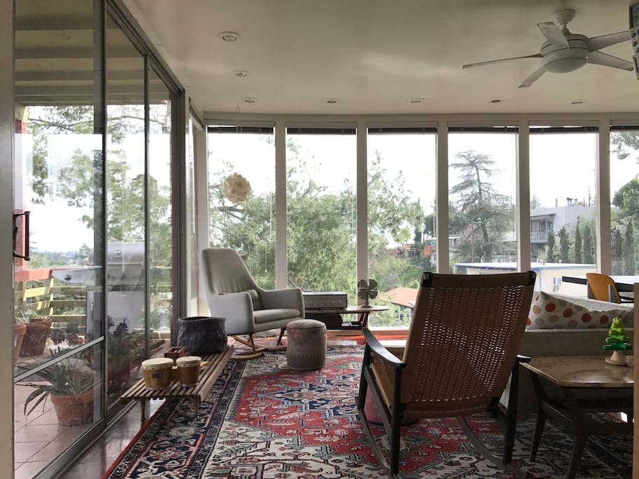 Floor to ceiling glass in living room / dining room