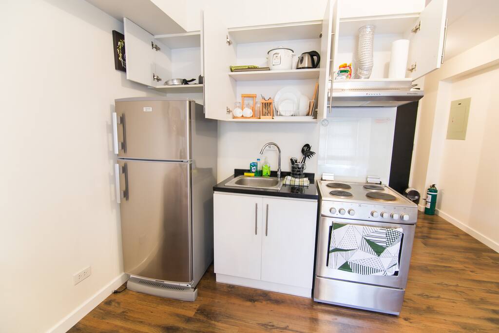 Kitchen with complete utensils and silverwares
