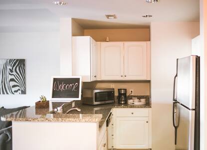 Cozy uptown retreat, walkable to everything.