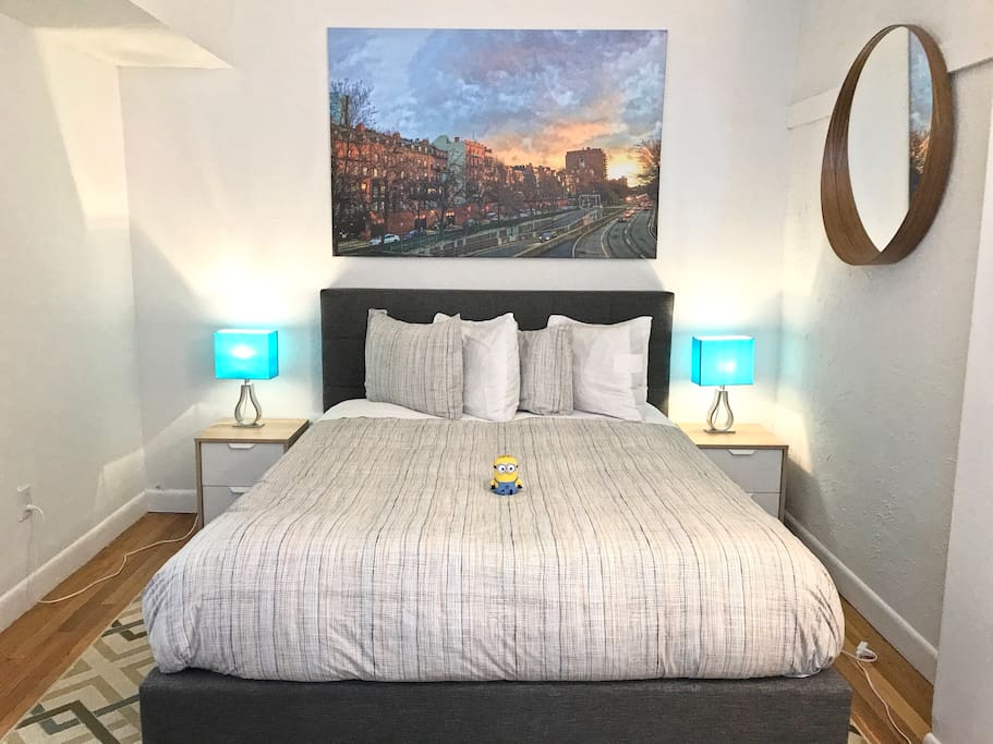 Rear Bedroom with Queen bed and our luxury mattress, high thread count sheets, and luxury pillows. Hey is that a Minion there too? ;)