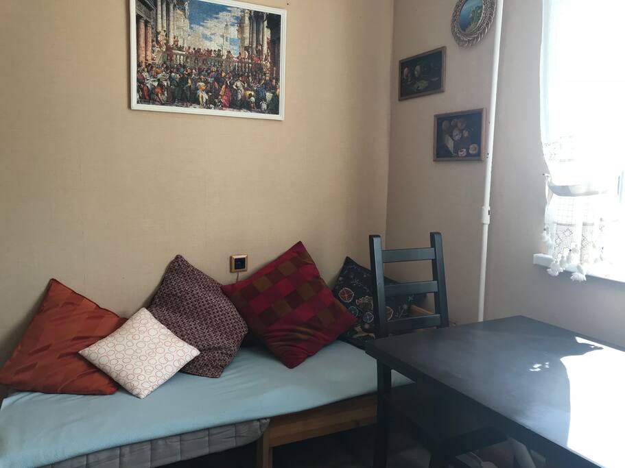 Small couch in the kitchen