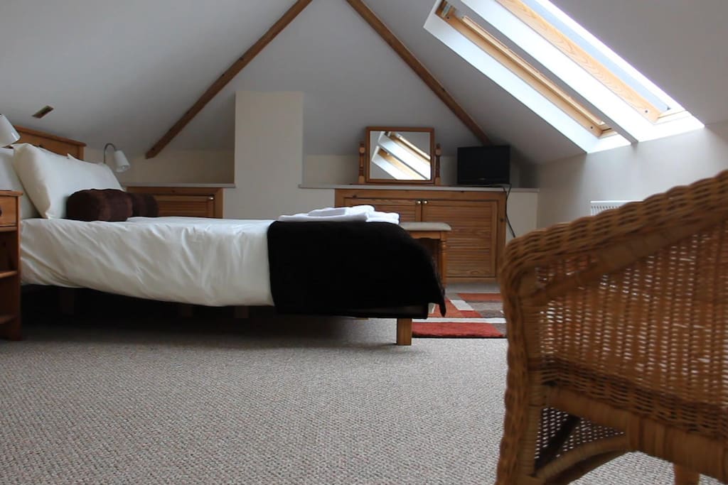 upstairs double bedroom with views towards Ben Lomond