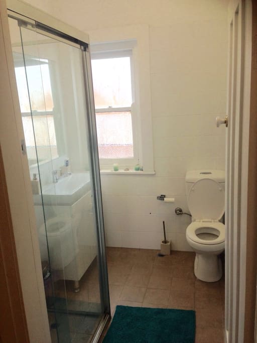 Bathroom with shower, toilet and sink