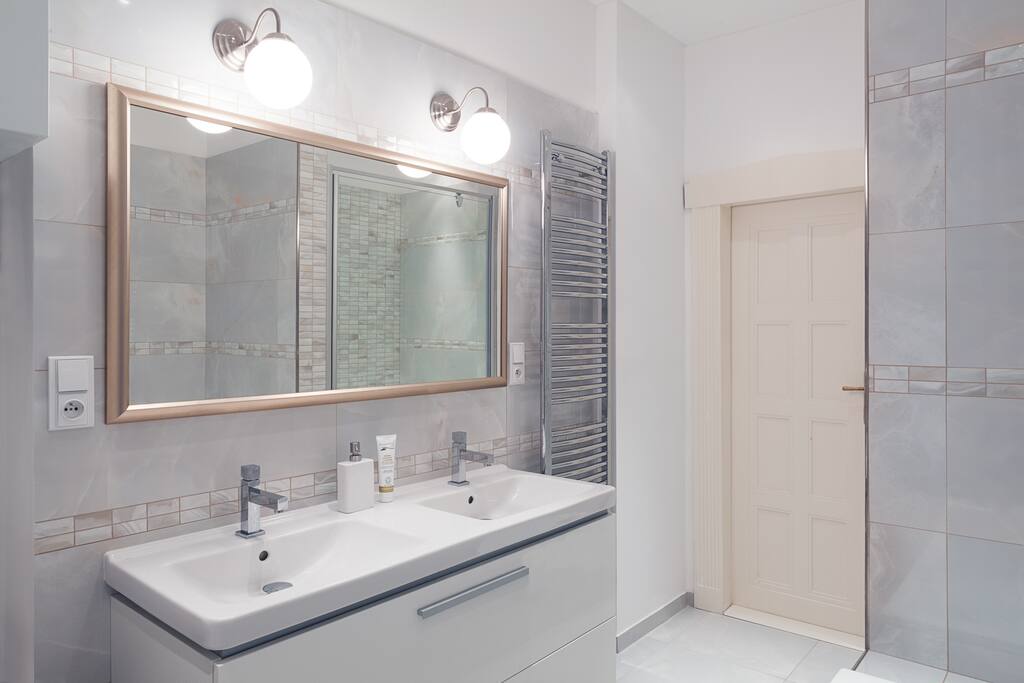 Generous bathroom with washer and dryer