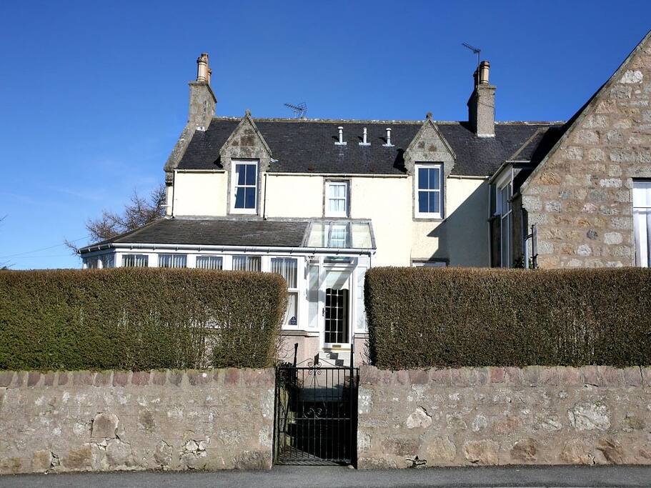 Front of house, car parking to rear