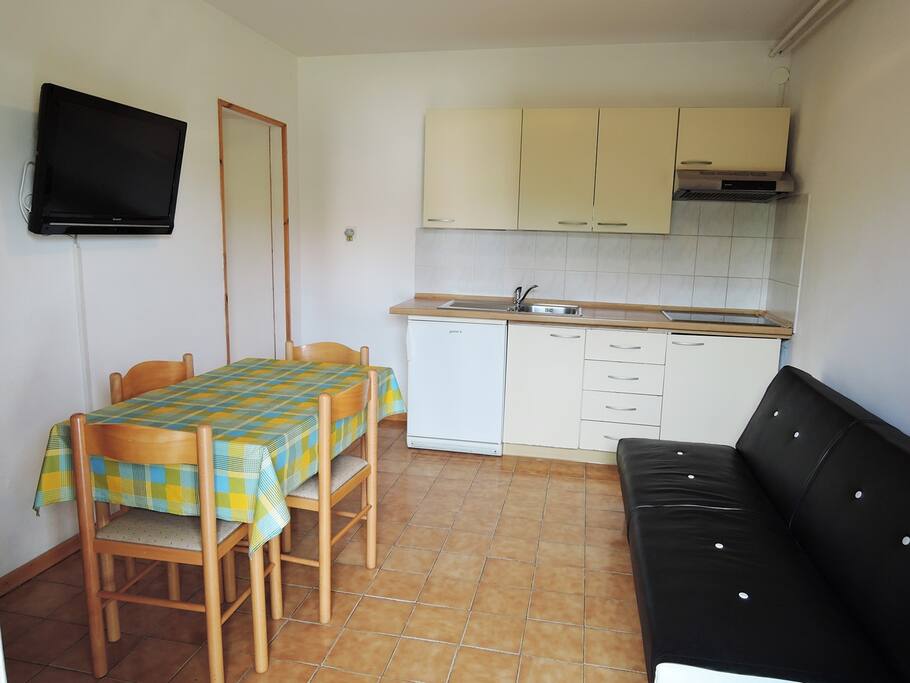 Kitchen, dining room and sofa