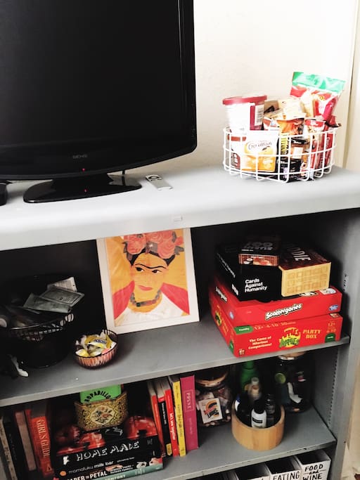 The TV has a DVD player attached and we also provide Apple Tv in the room that is linked to our cable. There are also various magazine, fun books, and games for your use. We have also provided a few snack options.