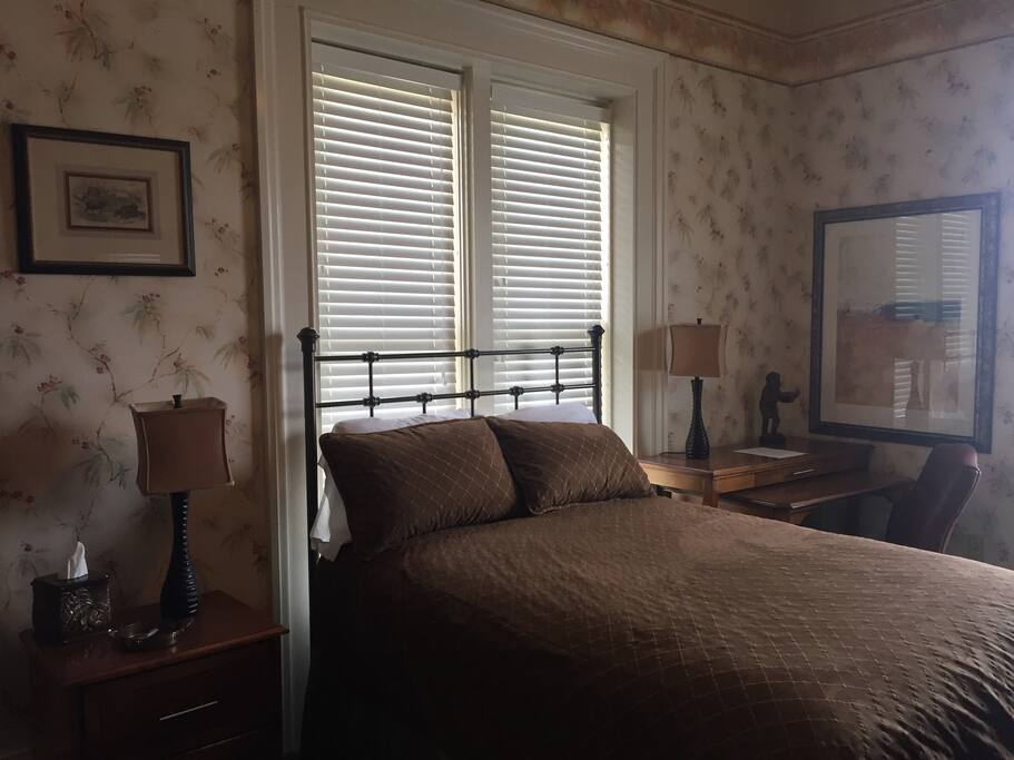 Full Size Bed and Desk Area