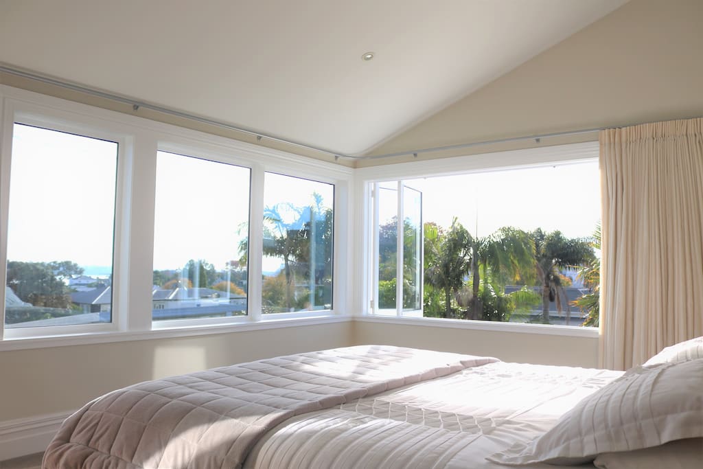 Master bedroom, soaked in natural sunlight