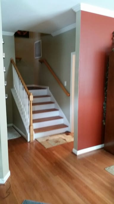 Front door entry to stair to room