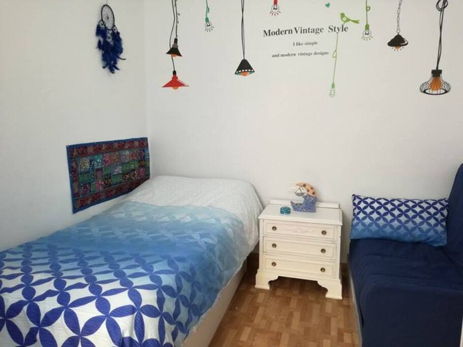 Habitación individual con sofá