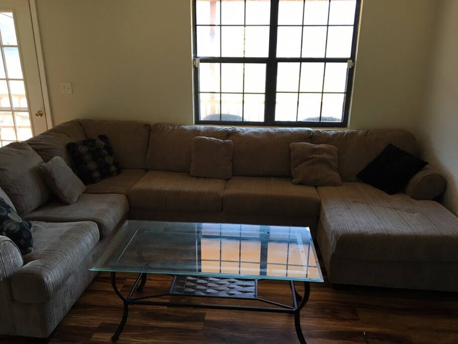 Living Room with sectional sofa. Two people could sleep here.