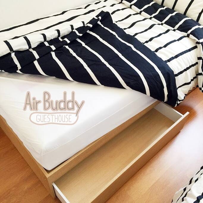 Two drawers under each bed