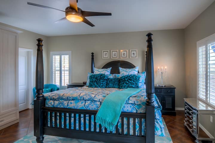 Master Bedroom Retreat has California King Bed, Upgraded Linens, TV, and a Ceiling Fan