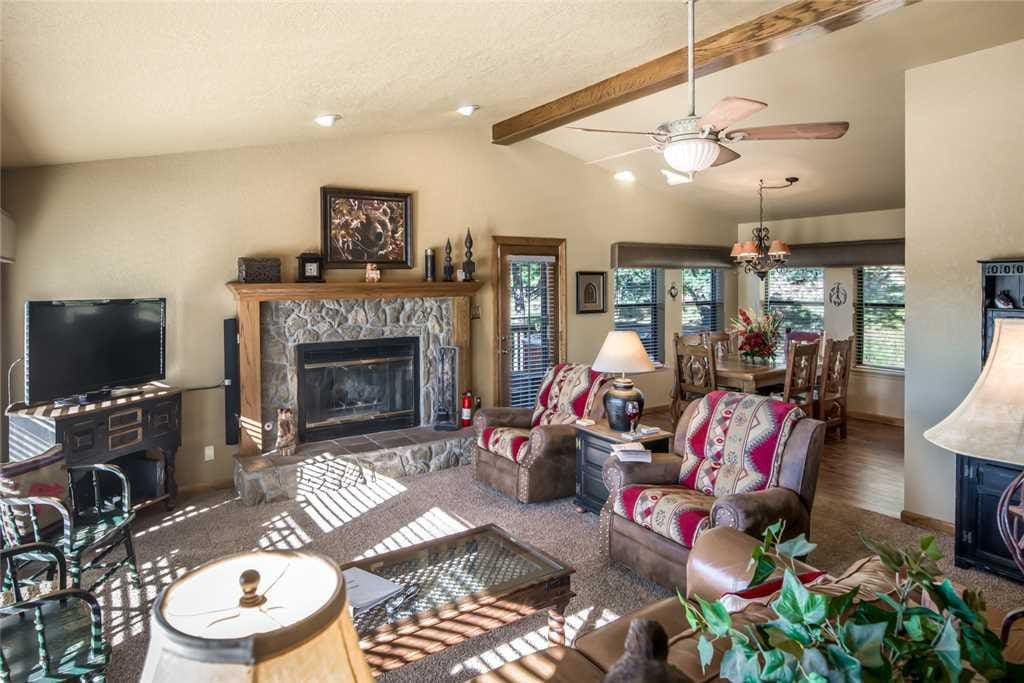 Gather in the well-appointed living room for movie night! Pop a few bowls of popcorn, put a movie in, and settle into our overstu