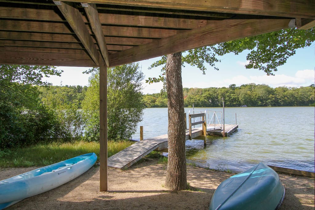 Private dock on the water's edge. Take the canoe or kayak out on the lake.