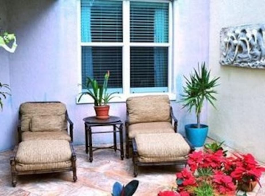 Two super comfy full chaise lounges on huge deck outside living room