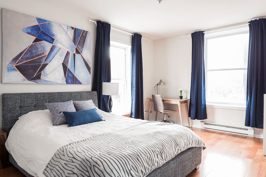 Master bedroom with a Queen memory foam mattress, a wood desk and a large closet. Lots of natural light!