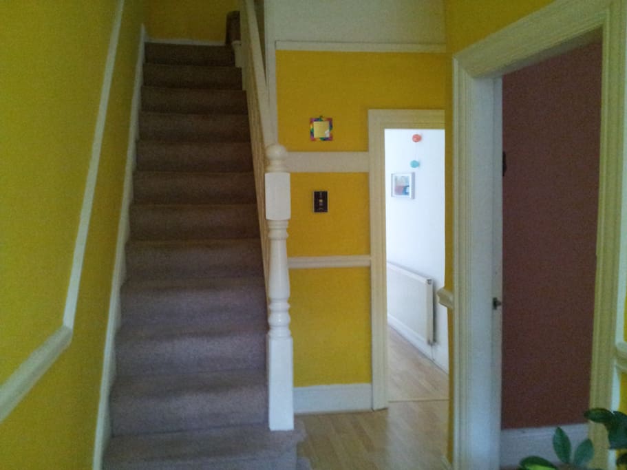Another view of the hall looking towards the dining room and kitchen. Your double bedroom is upstairs