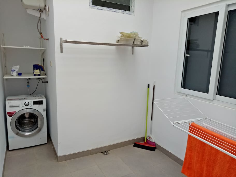 Backyard with open air circulation and washing machine, hanger for drying