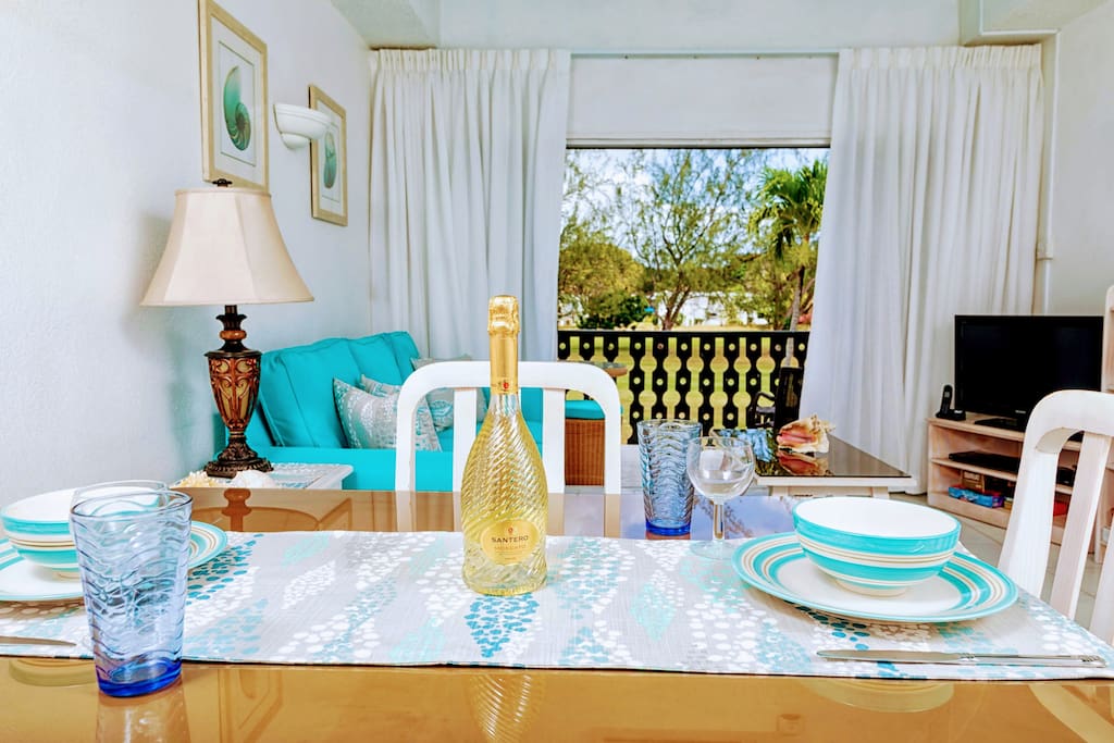 Very breezy living room (with AC if you prefer) with view of the golf course