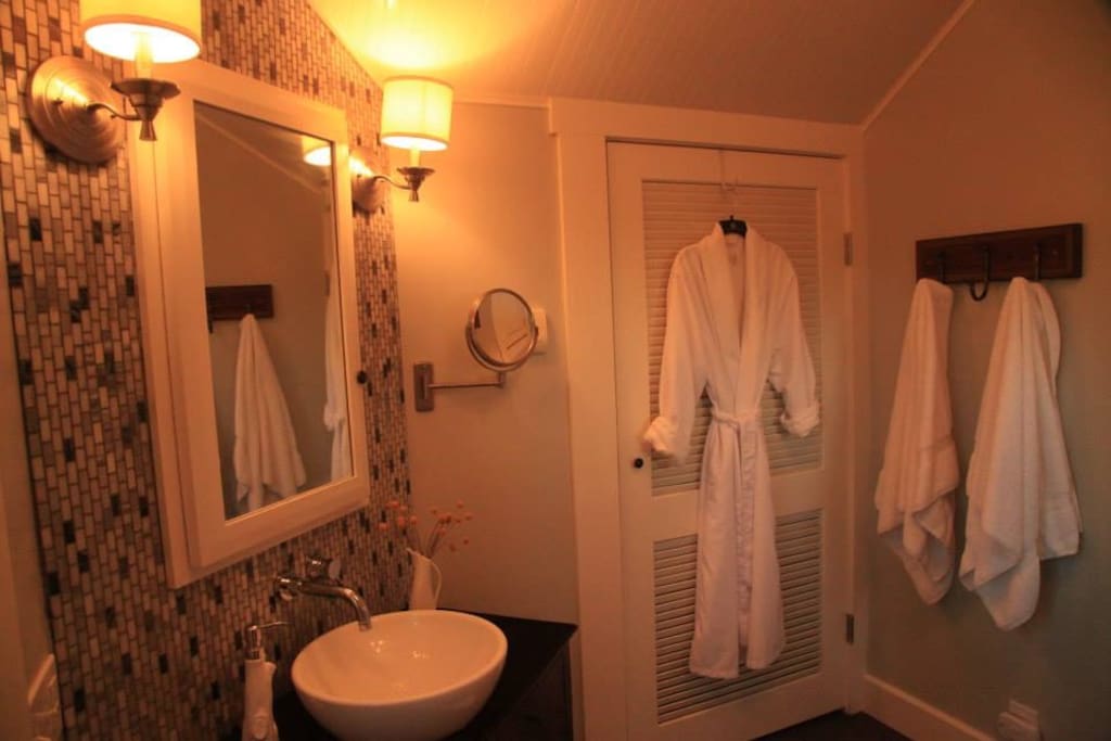 cozy robes, fluffy towels provided for luxurious comfort
