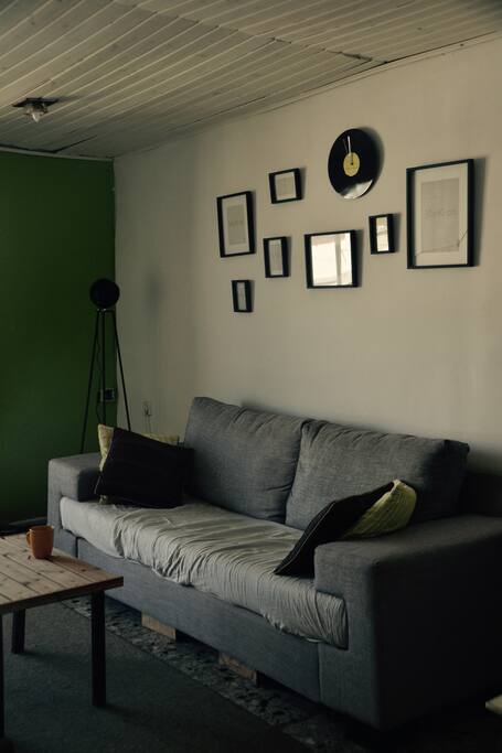 Spacious living room with a door on balcony