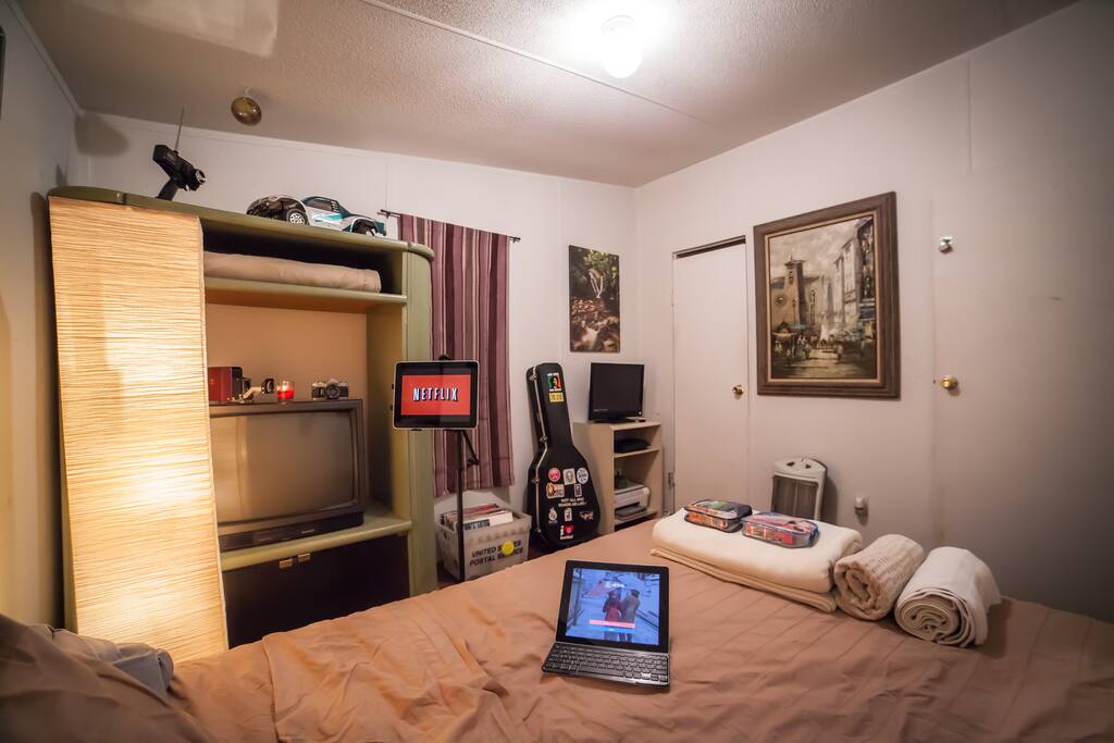 Ipad with Netflix provided upon request, Ill even include the second Ipad with the keyboard if you really need it