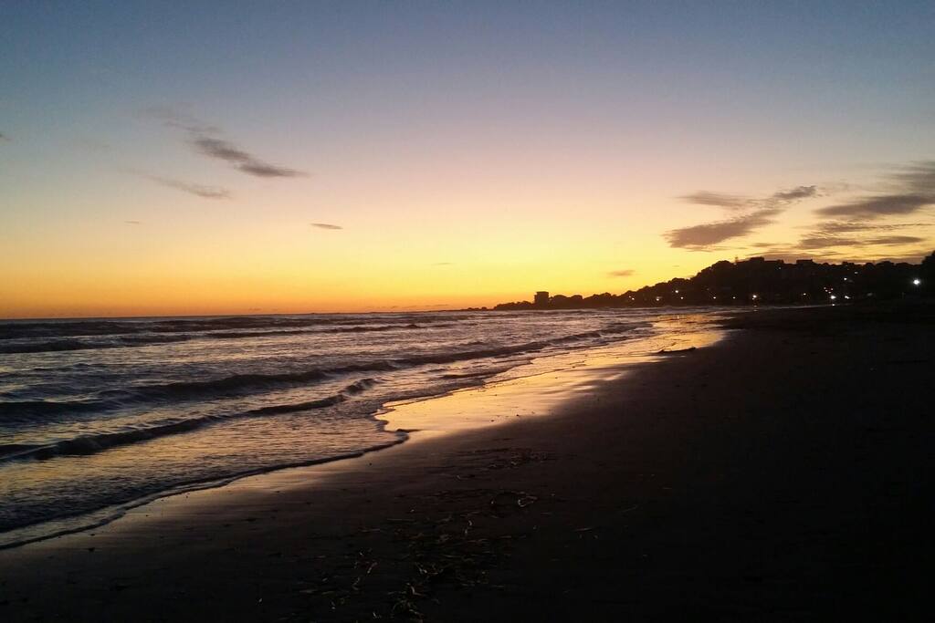 The beach (below the House) at the sunset
