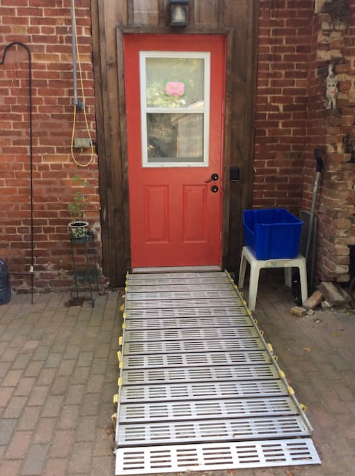 Back Door with Lock Box and Wheelchair ramp.