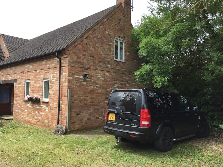 Plenty of room for two vehicles at the side of the property!