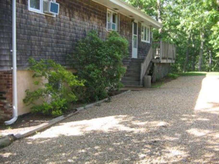 Private driveway and entrance to condo. Can accommodate two cars end to end....