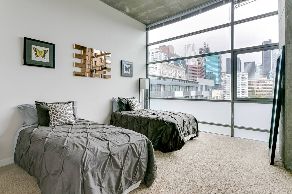 Bedroom With Stunning City Views. Beds Can Be Set Up as 2 Twin-Size Beds or 1 King-Size Bed.