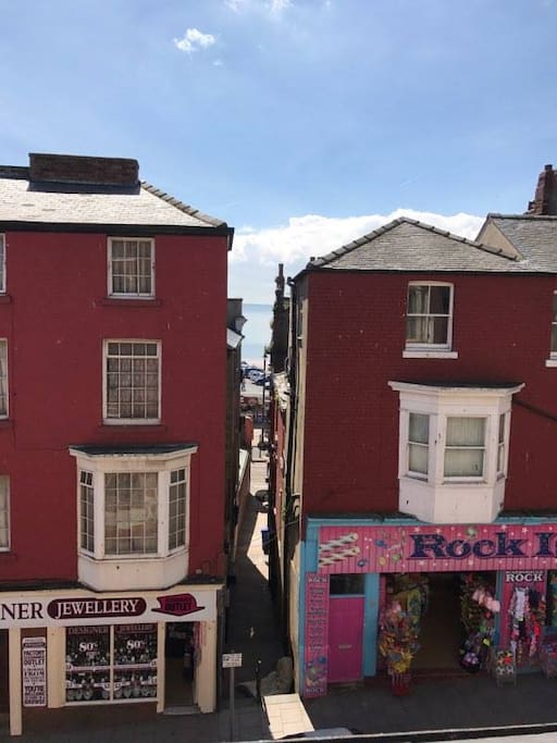 Literally 2 mins from beach...View from attic window, through snicket and your on the beach