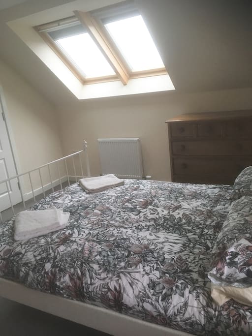 Private double bedroom with en-suite. A set of drawers and part of a fitted wardrobe available.