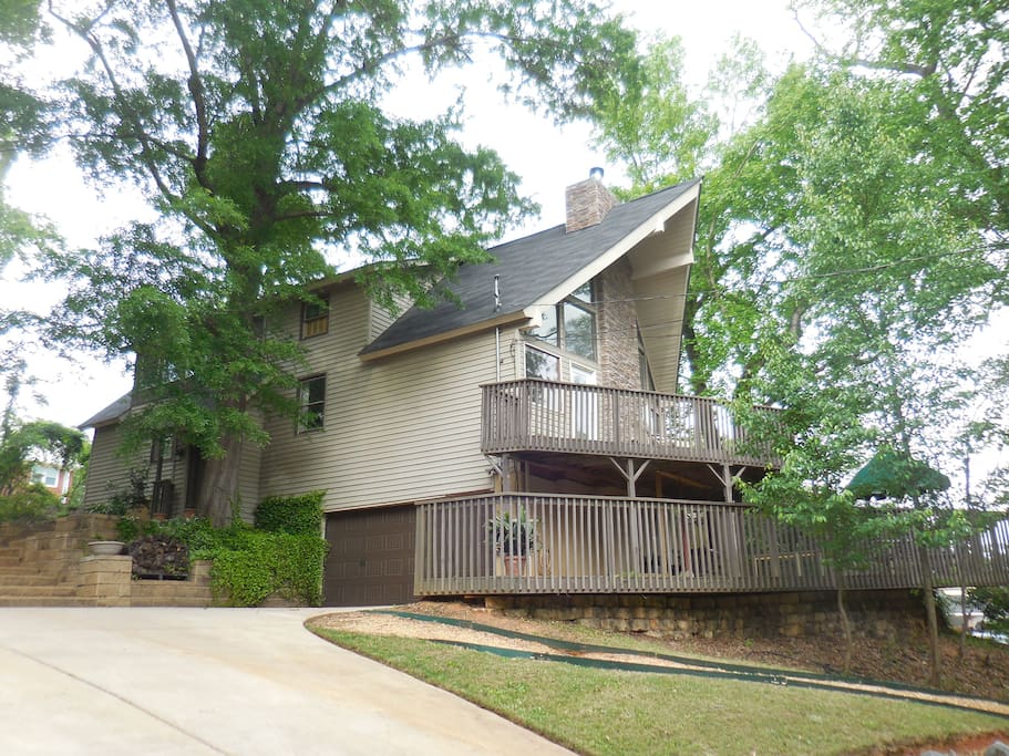 View of the this Hillside Retreat and wooded lot from the street!