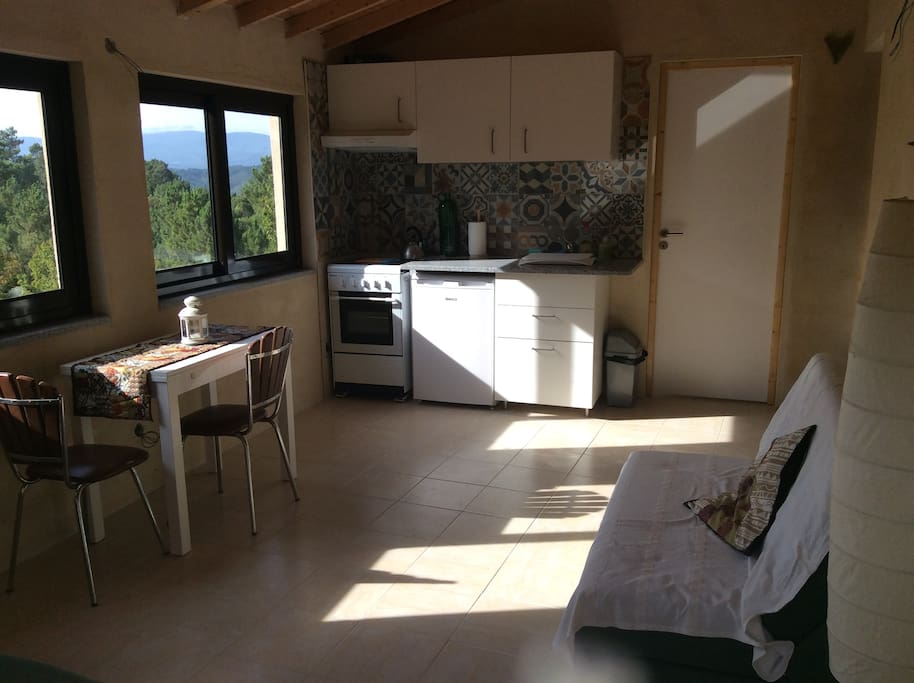 Spacious lounge / dining/ kitchen with spectacular views over the mountains