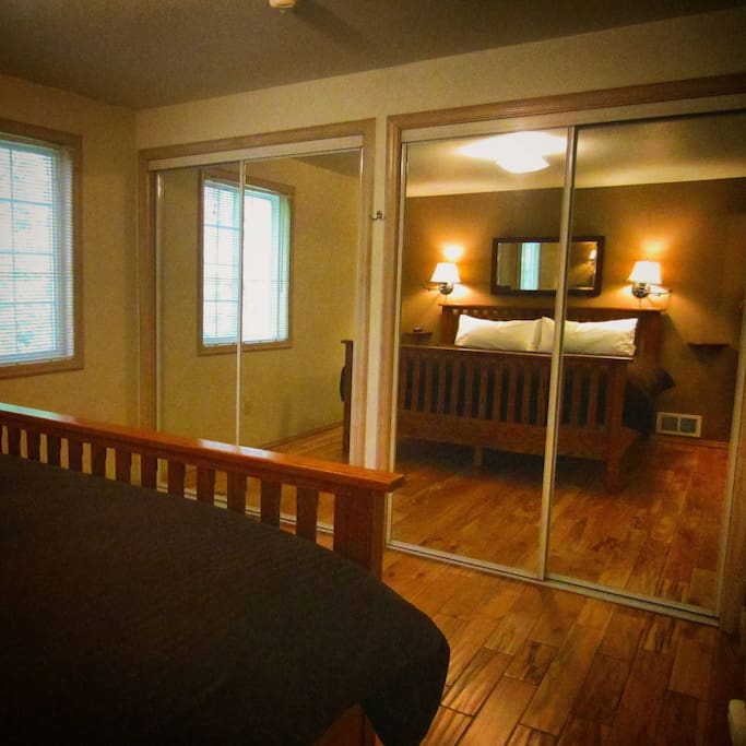 Another view of the Master Bedroom. We love how the mirrors open up the space!
