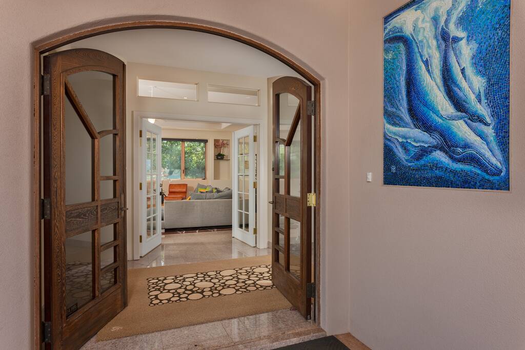 Inside, the home features stunning and lavish touches, including marble floors and walls throughout, massive floor-to-ceiling windows to enjoy the amazing views, custom Italian furniture, and a 46 X 75-inch TV with 3D viewing.
