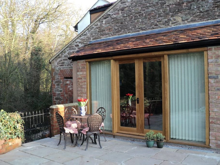 Private courtyard overlooking the brook and countryside beyond