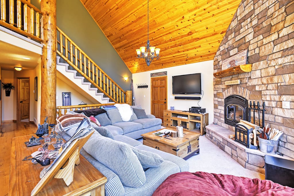 Admire the gorgeous stone work around the fireplace.