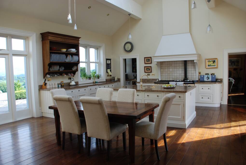 Large bright kitchen with Aga and extending dining table