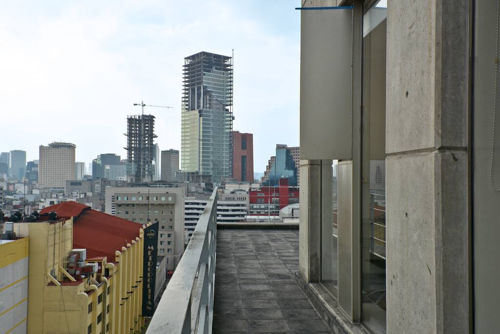 bedroom terrace view of the city